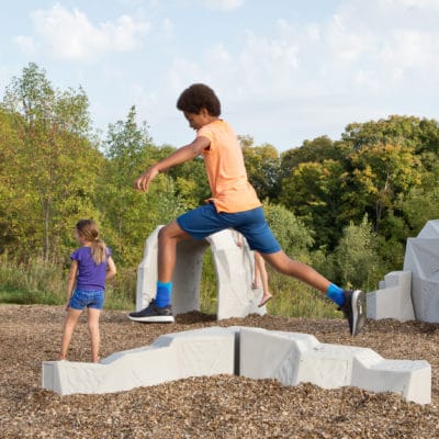 playground concrete forms with kids playing